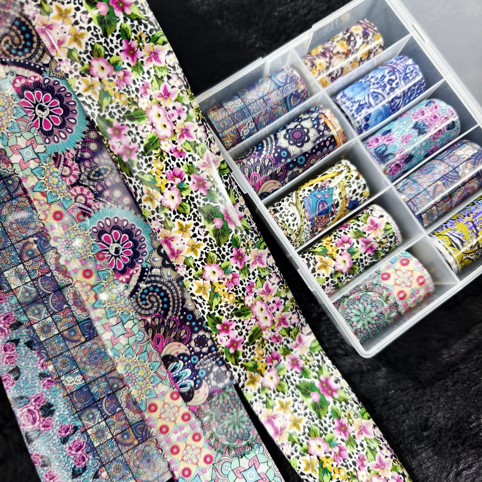 Nail foil rolls in floral patterns, 10 colorful rolls arranged in a clear organizer by Simples Market