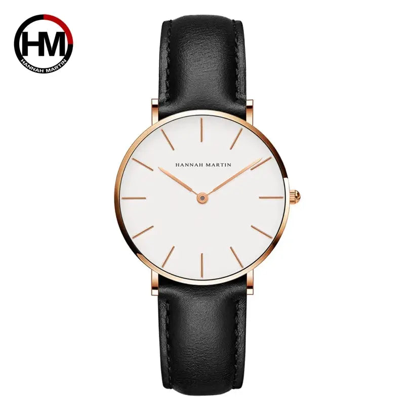 Hannah Martin women's wristwatch with rose-gold case, white dial, and black leather strap, 36mm.