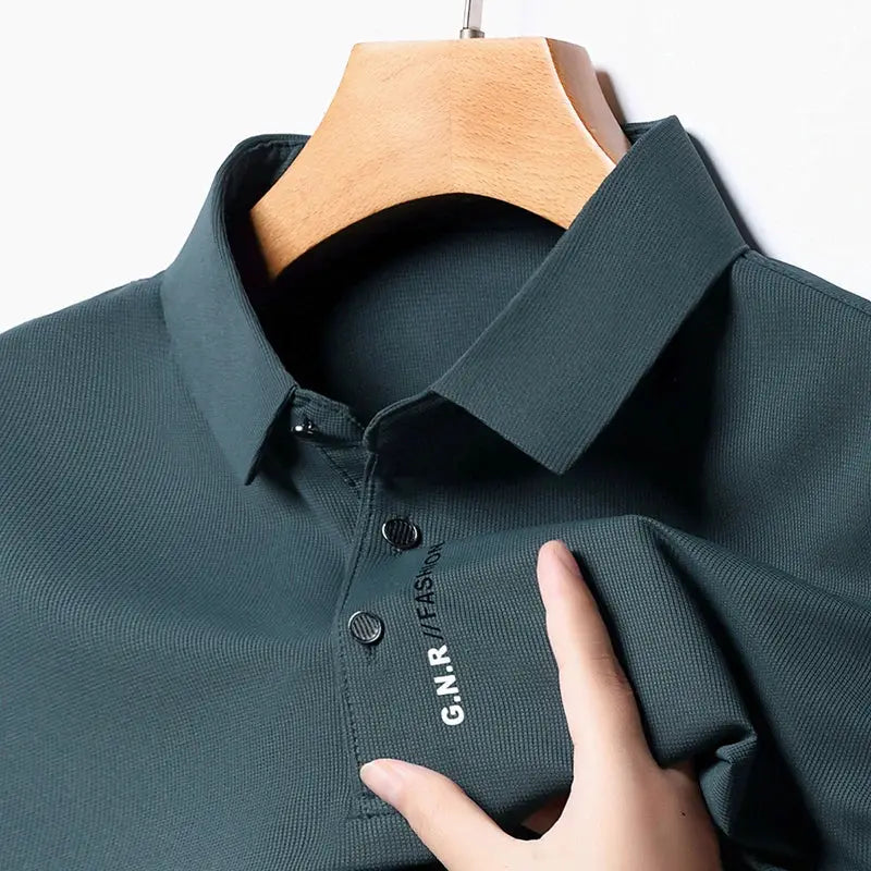 Men's teal polo shirt by G.N.R. FASHION; short sleeves, breathable textured fabric