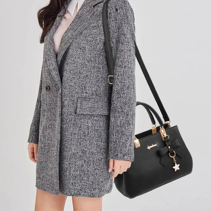 Simples Market black bowknot crossbody shoulder bag with gold hardware