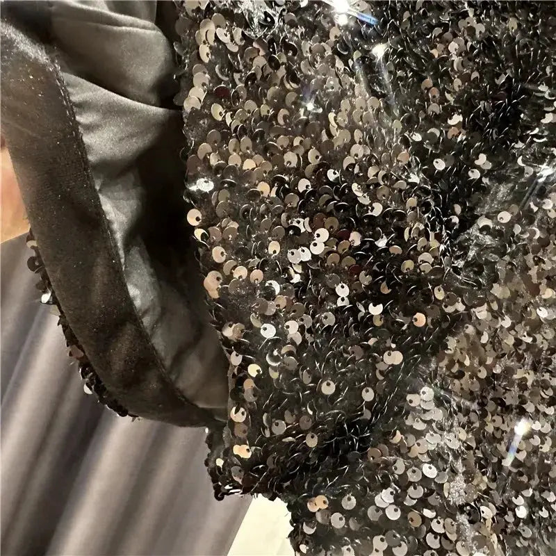 Black velvet shorts with silver sequins for a shiny clubwear look