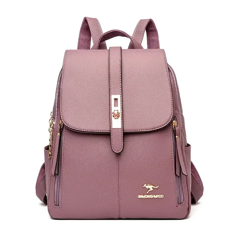 Women's purple pebbled leather backpack with front strap closure, gold hardware, and side zip pockets.