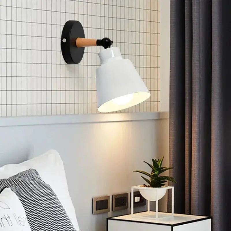 Nordic solid-wood LED wall lamp with white conical shade, black circular mount and wooden arm