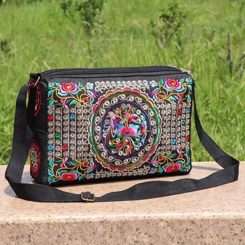 Women's embroidered nylon crossbody bag with colorful floral pattern, large capacity travel bag, adjustable strap.