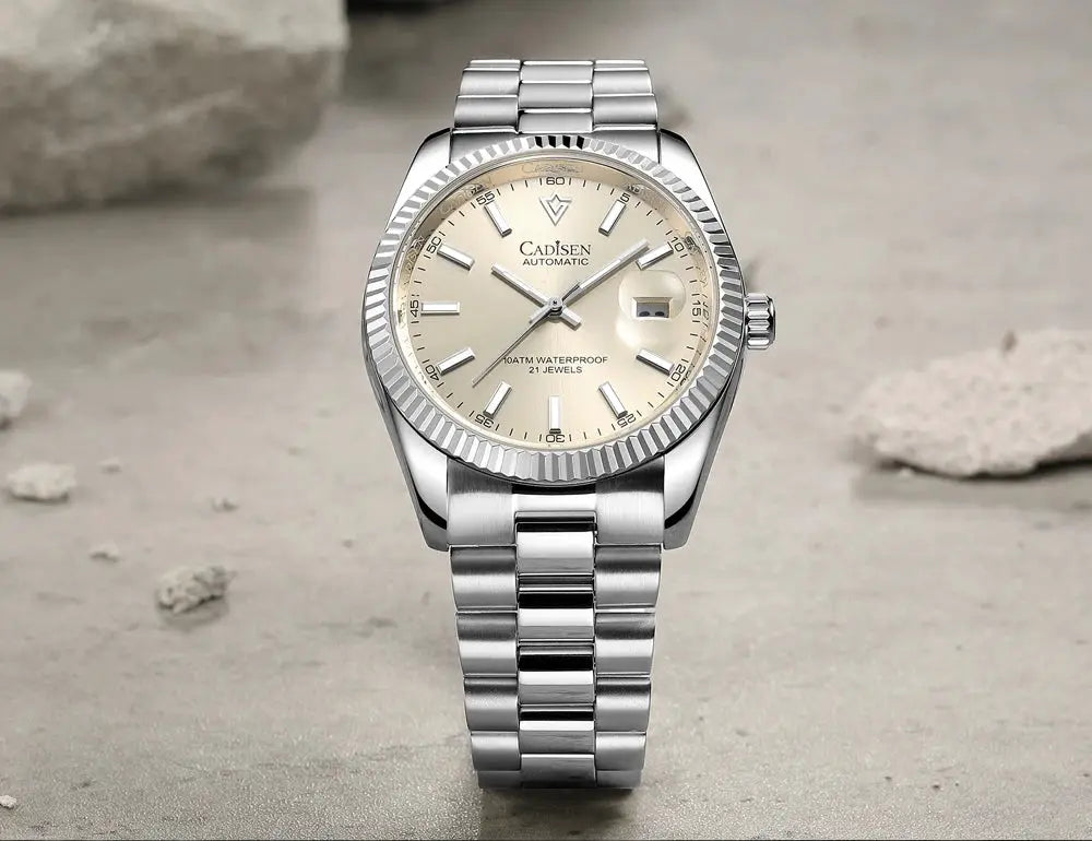 CADISEN automatic men's watch with stainless steel bracelet, beige dial, date window, and fluted bezel