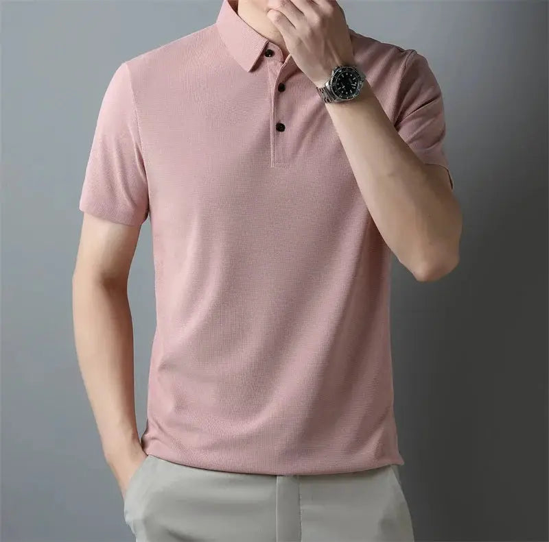 Men's pink polo shirt with short sleeves and classic collar