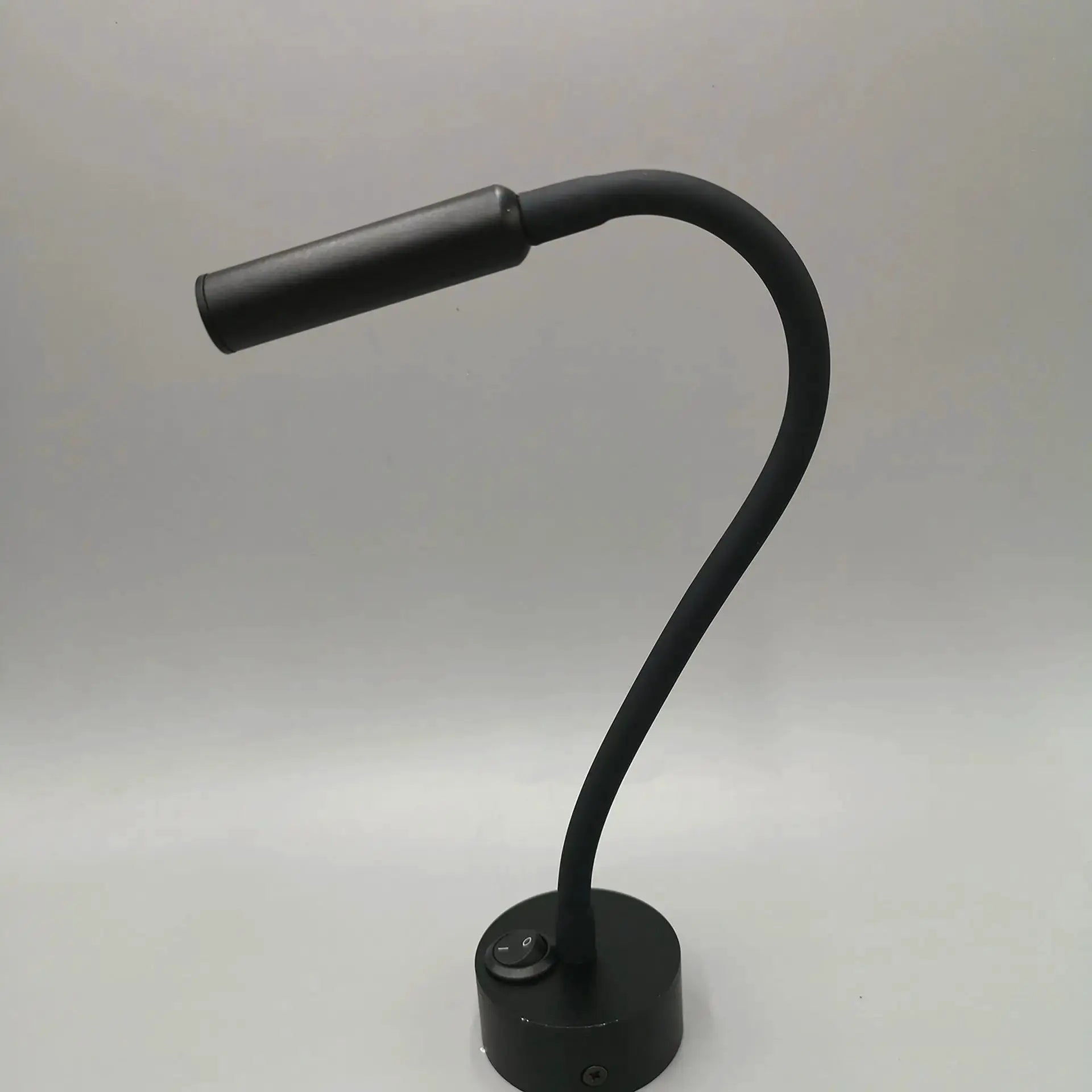 Simples Market LED flexible gooseneck wall lamp in black with cylindrical head and base-mounted switch