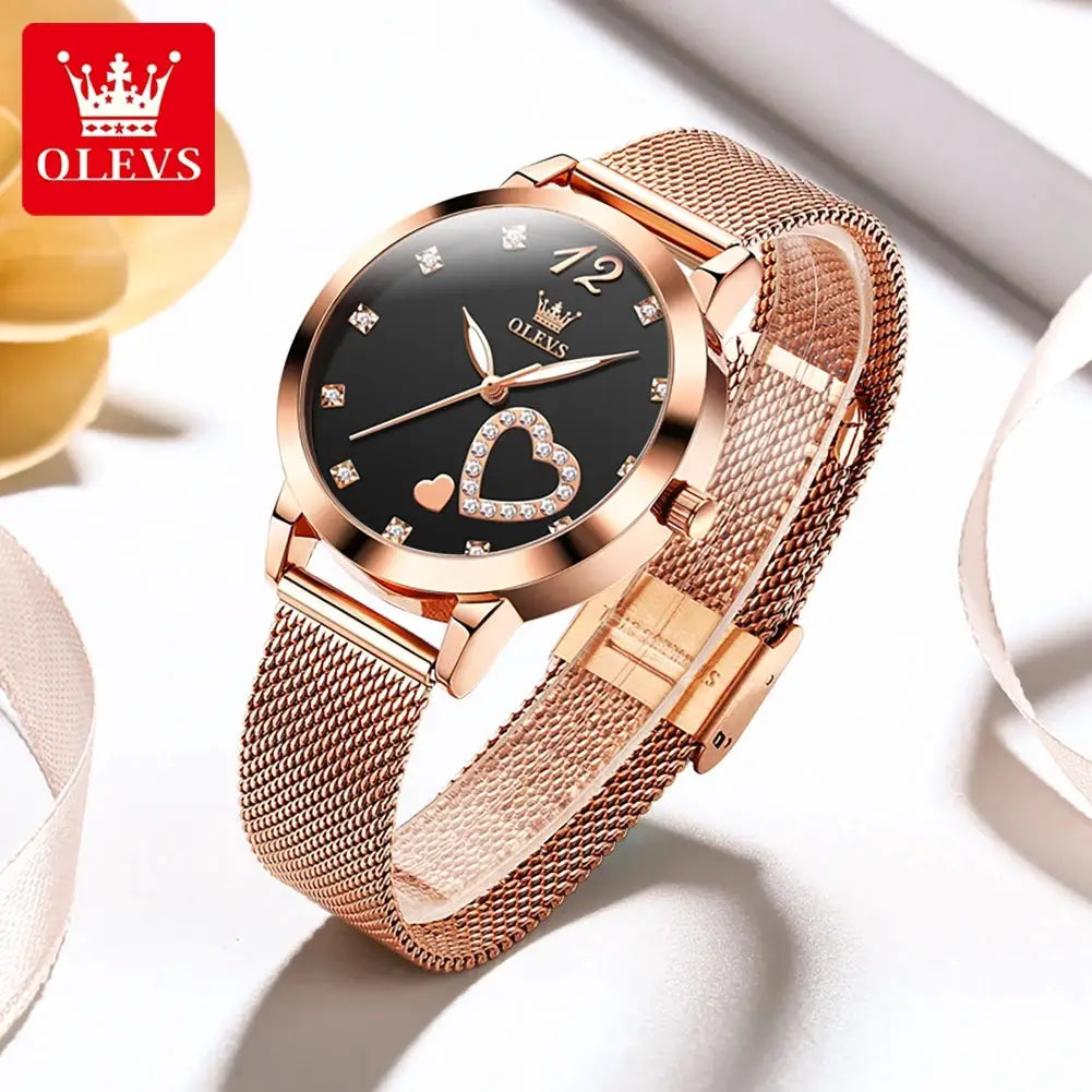 OLEVS women's quartz wristwatch with rose-gold mesh strap, black dial and heart crystal accent