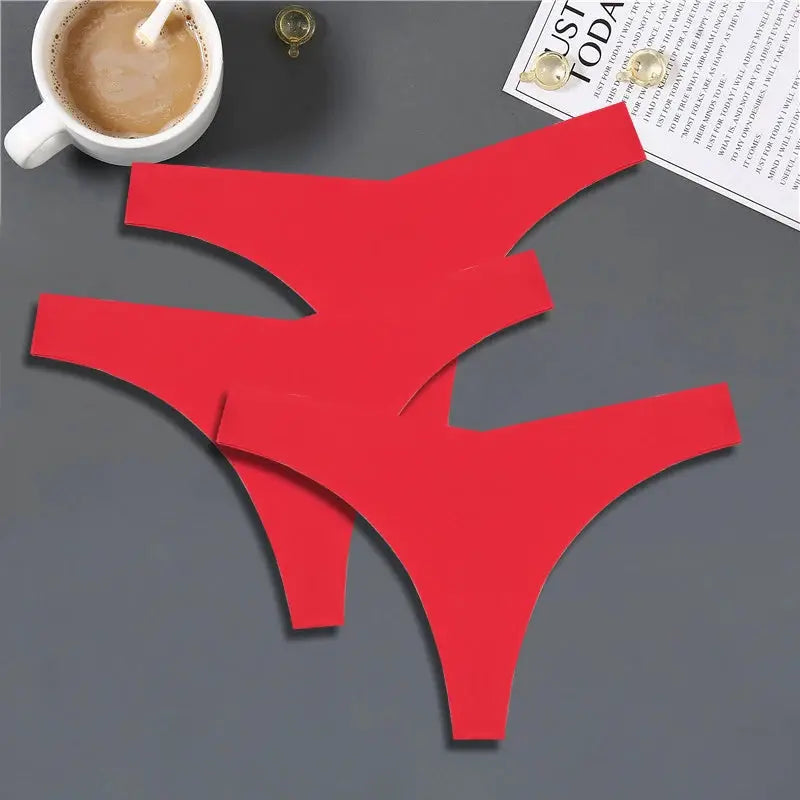 Three red seamless V-waist thong underwear set, low-rise G-string style.