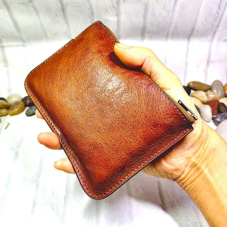 Mini brown leather zipper waist bag; compact card/ID wallet
