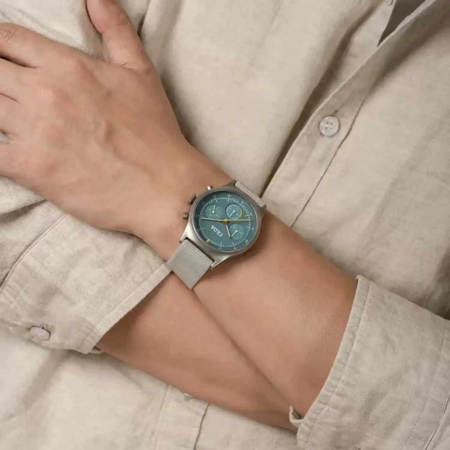 CILOA round teal dial chronograph men's watch with silver mesh strap