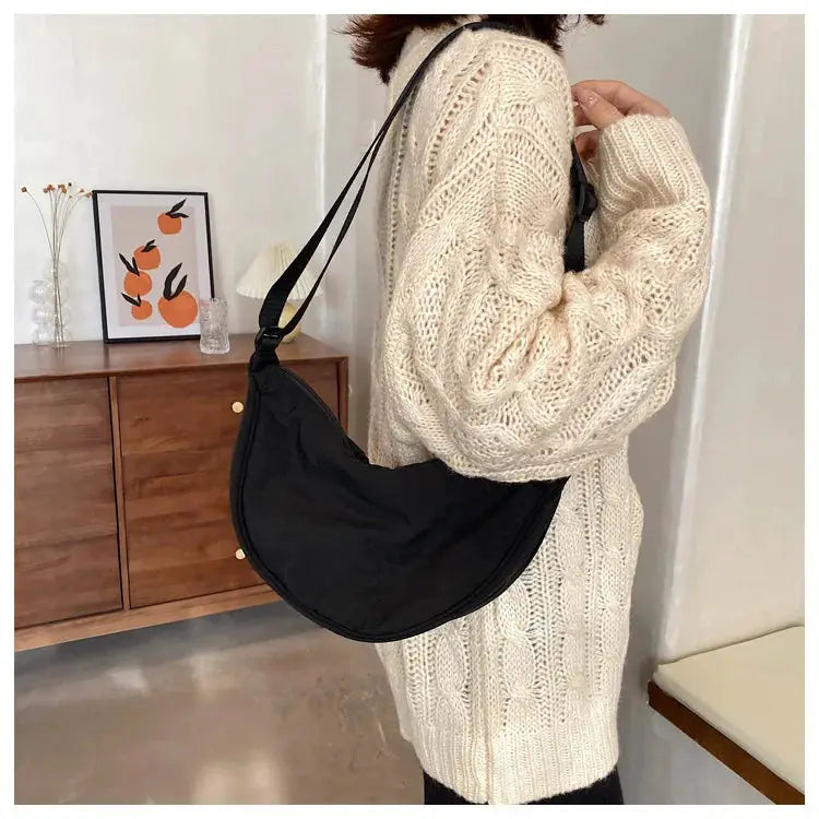 Casual nylon hobo crossbody bag in black with adjustable strap, large-capacity designer tote by Simples Market.