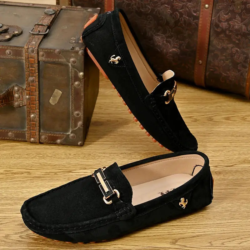 Set of 2 black suede loafers with gold horse emblem and buckle hardware