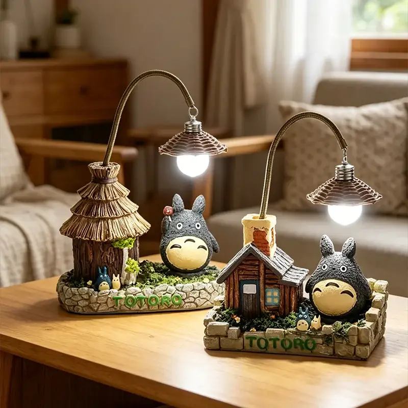 Creativity LED desk lamp set with Totoro anime figurines; two lamps with curved brass shades by Simples Market