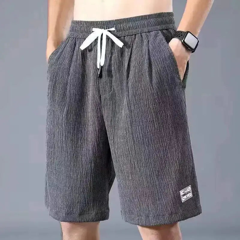 Men's ice silk casual shorts gray with white drawstring, elastic waist and pockets; Simples Market logo patch