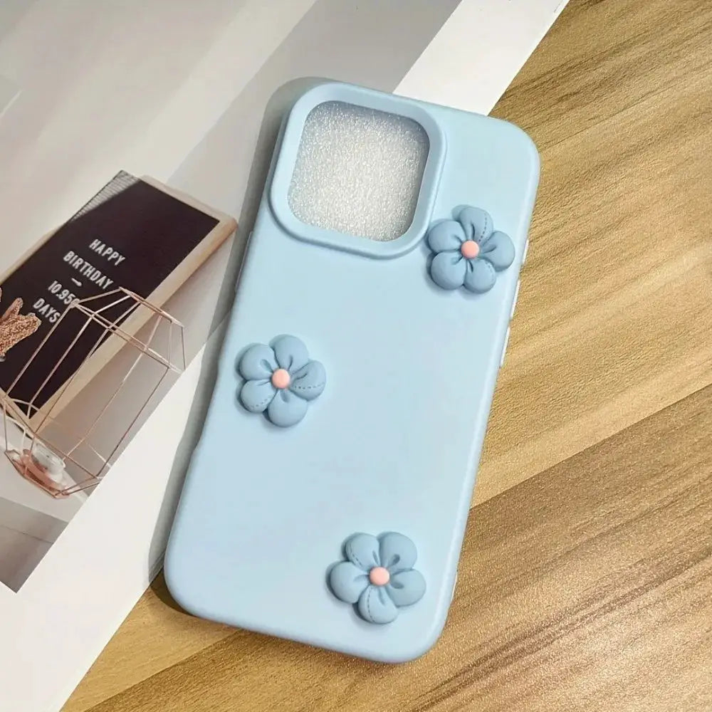 Phone case for iPhone with light blue matte finish, shockproof, 3D blue flower decorations