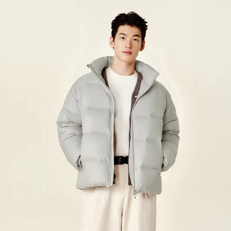 Men's light gray quilted puffer jacket with stand collar and zip front