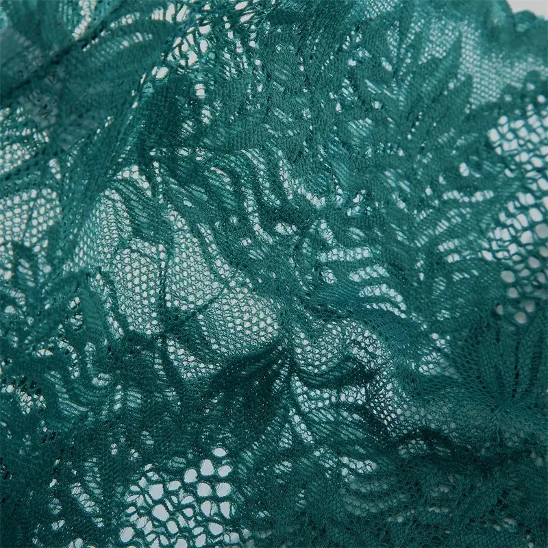 Teal lace floral boyshorts underwear, close-up fabric pattern