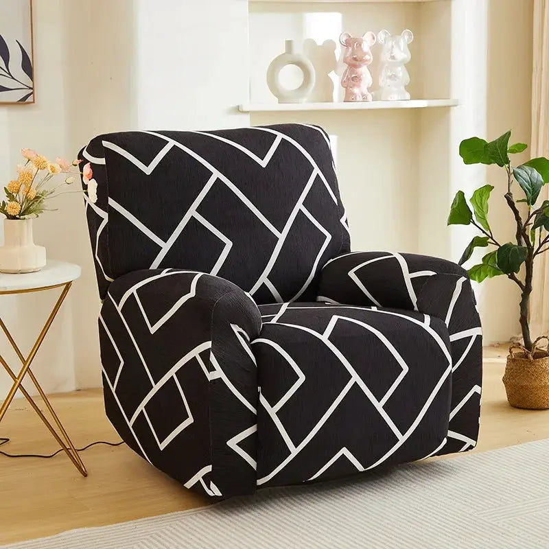 Elastic recliner sofa cover in black with white geometric line pattern on a living room armchair.