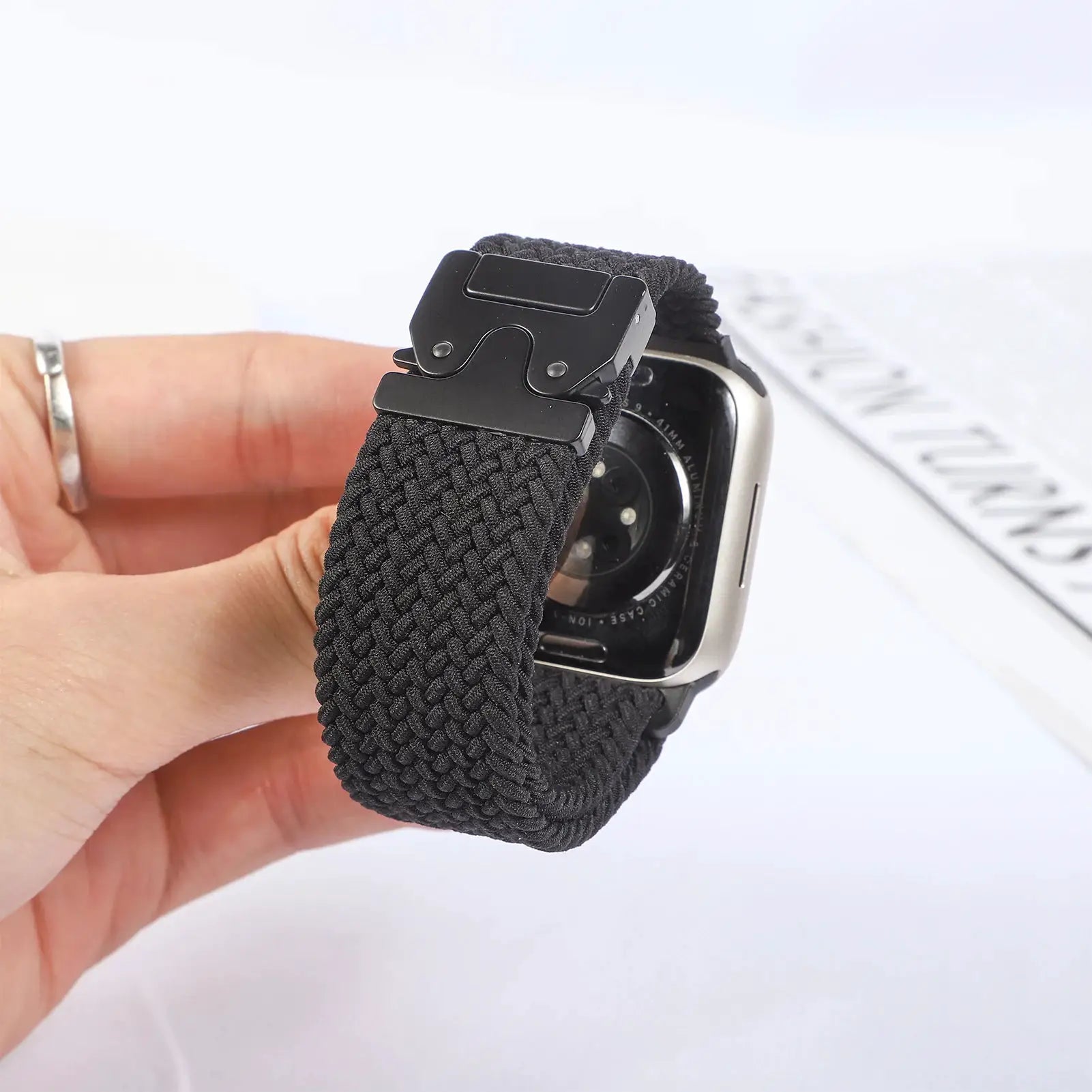 Parachute braided Apple Watch strap by Simples Market with black metal buckle