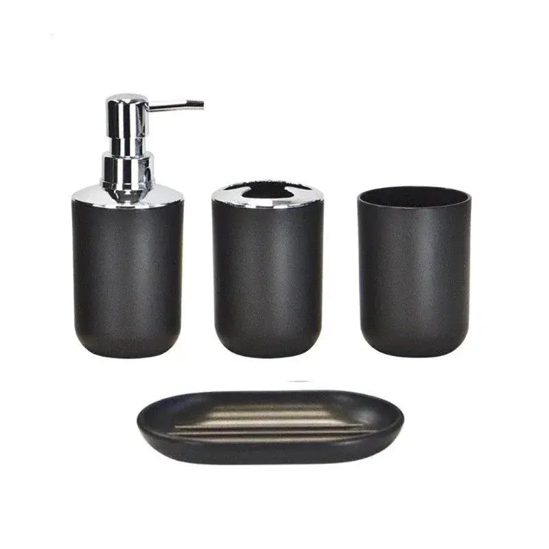 4-piece bathroom set in black-gray plastic including soap dispenser, toothbrush holder, cup and soap dish