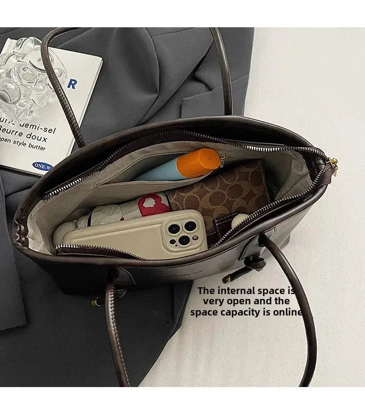 PU Leather Shoulder Bag for Women, brown with spacious interior and top zipper, crossbody style.