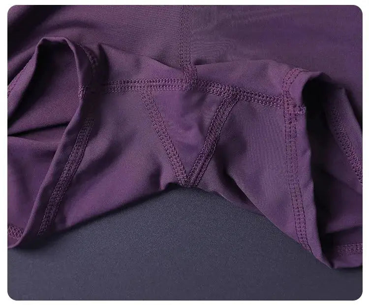 Women's purple 2-in-1 shorts with pockets, lightweight breathable fabric and split-side design