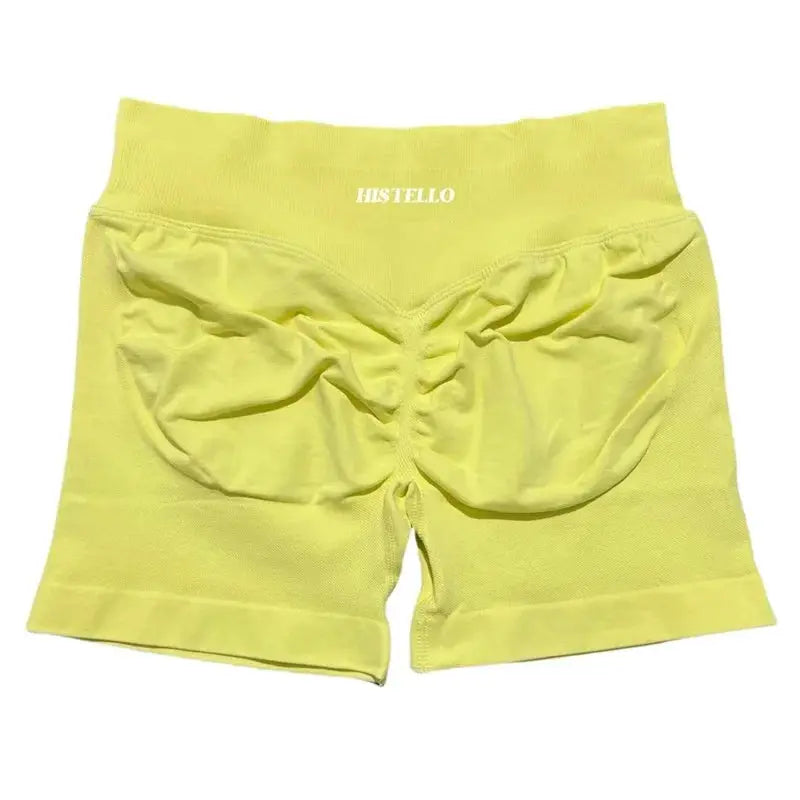 HISTELLO women's sport shorts in lime yellow, low-waist with scrunch back, breathable stretch fabric