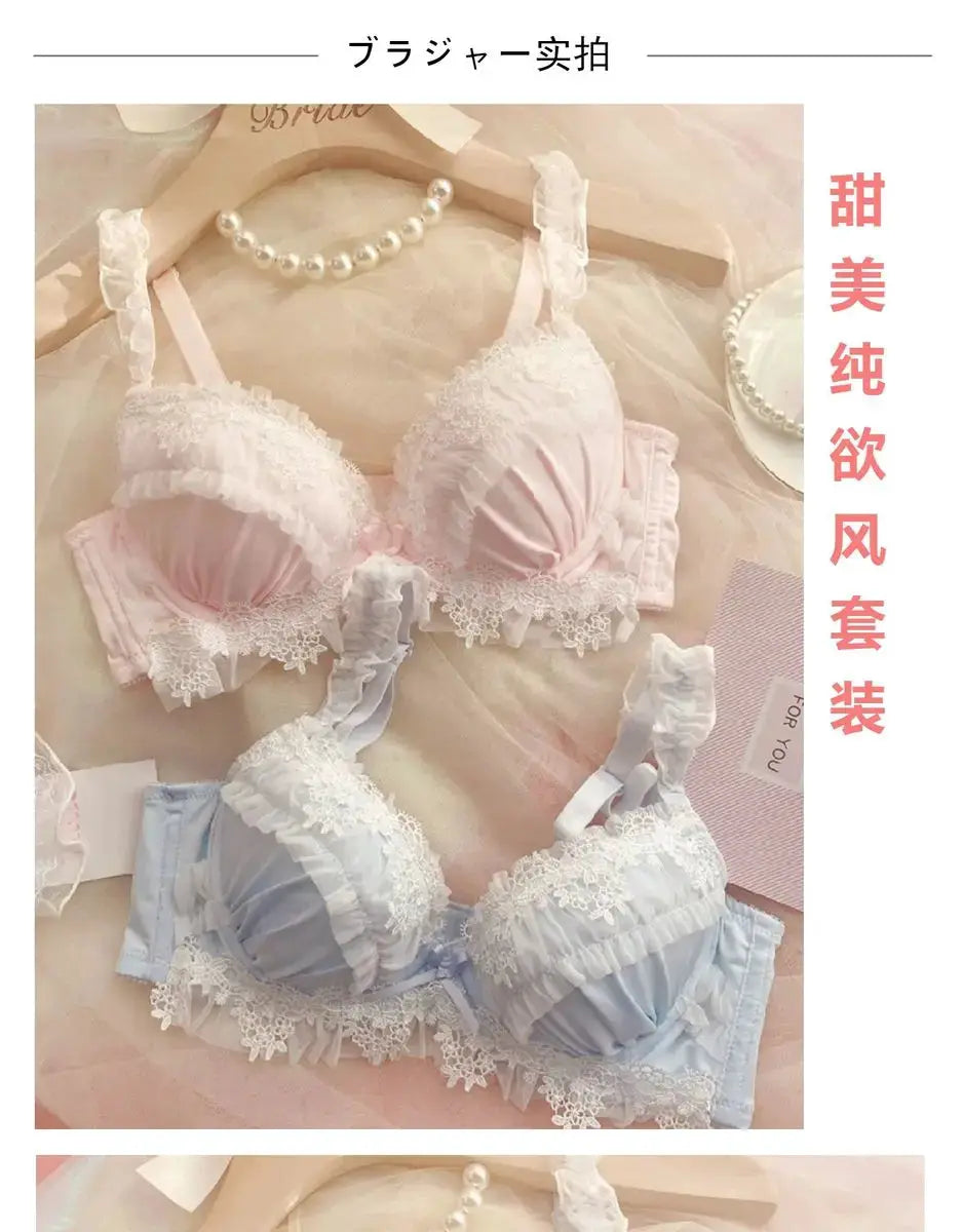 Lace bra set in pink and baby blue with white floral lace trim; two-piece set.