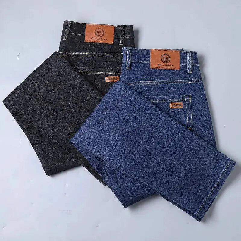 Men's jeans set by Simples Market; three denim pants in black, dark indigo, and medium blue with leather patches.