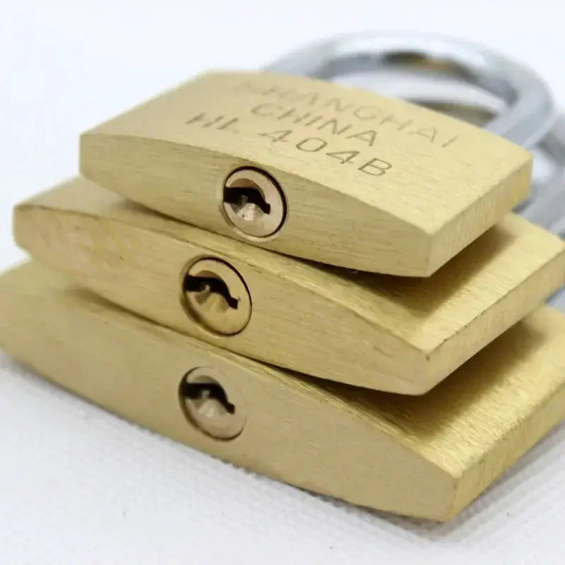 Copper padlock set with three small brass locks for luggage and lockers, includes 3 keys