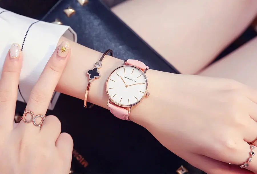 Hannah Martin women's rose-gold watch with pink leather strap and minimalist white dial