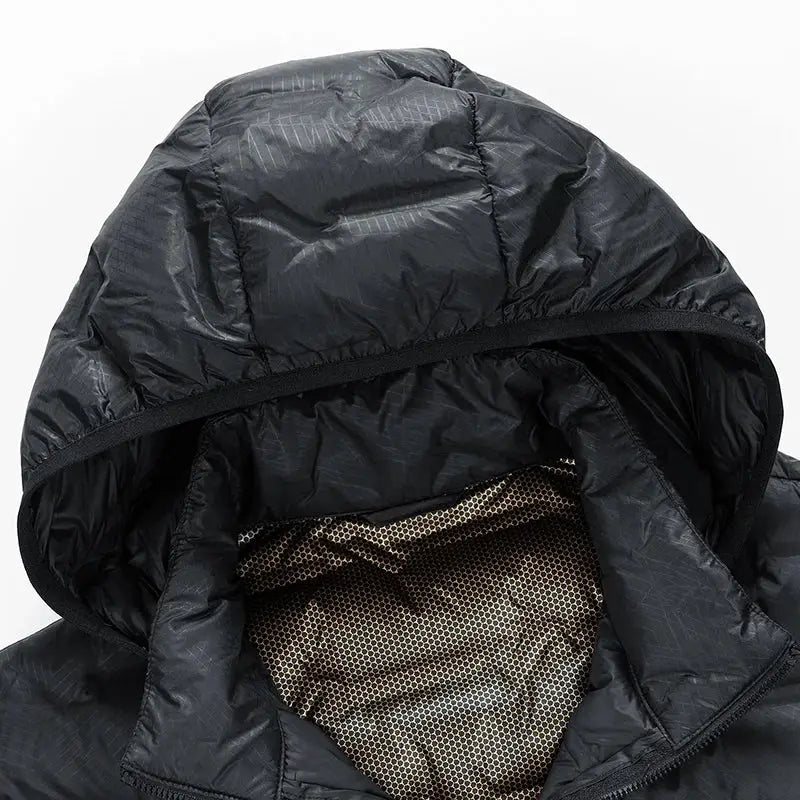 Men's black hooded down jacket with quilted shell and beige mesh lining, puffer style