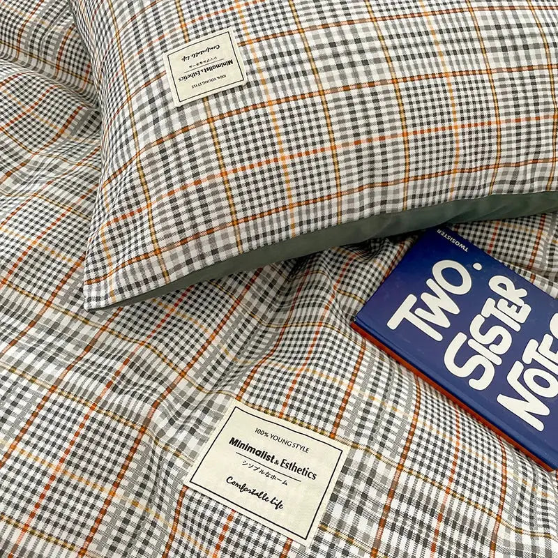 Simples Market Nordic plaid cotton bedding set with duvet cover and pillowcases; gray, white, orange.