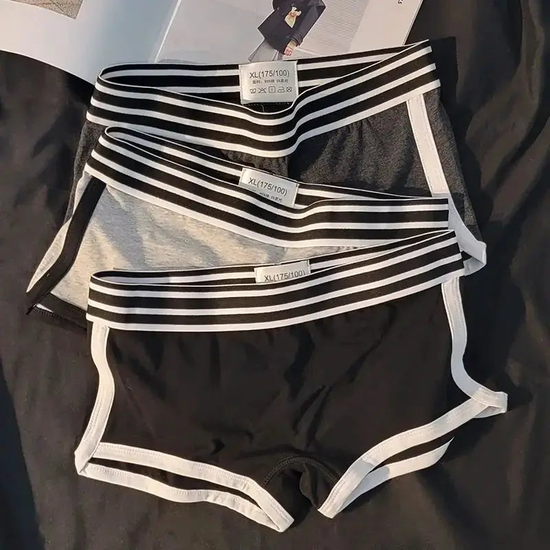 Women's low-waist boxer briefs set in black and gray with striped waistbands; breathable fabric, 4 pieces.