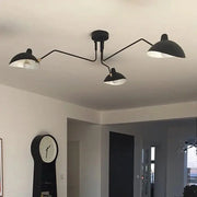 Spider pendant light with three arms in black metal and white interior shades, LED ceiling lamp