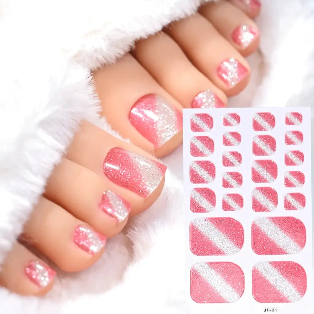 Toe nail sticker wraps in pink glitter with diagonal white stripe; Simples Market 22-count DIY decals