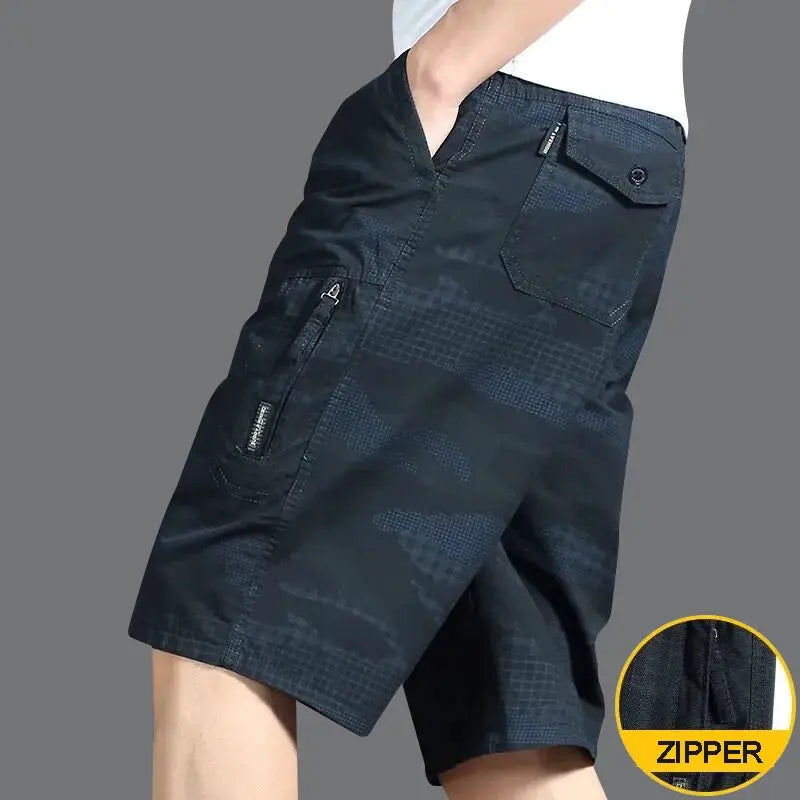 Men's knee-length cotton cargo shorts in dark navy with zipper pockets