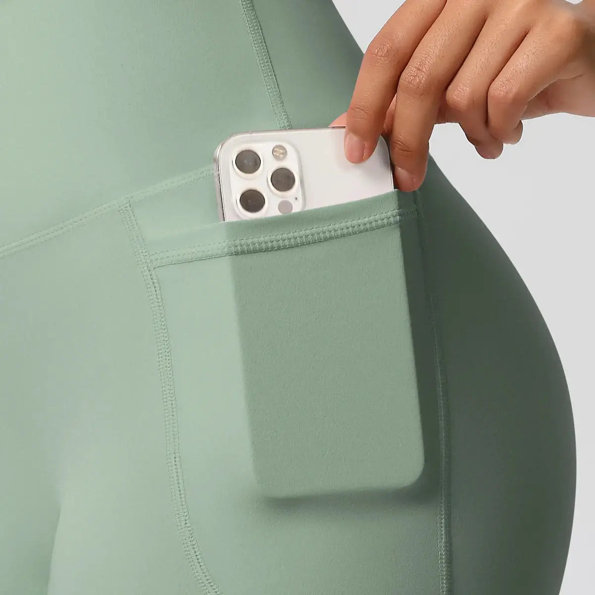 Pocketed yoga leggings for women in sage green by Simples Market