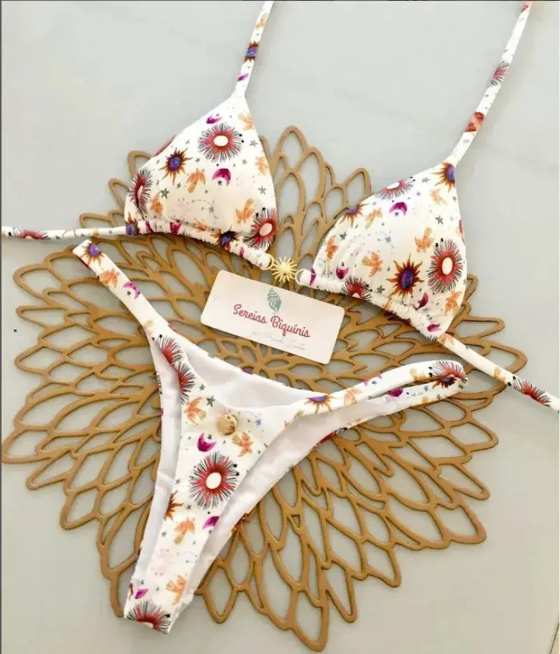 Two-piece bikini set in white with colorful floral print, halter top and thong bottom, Simples Market