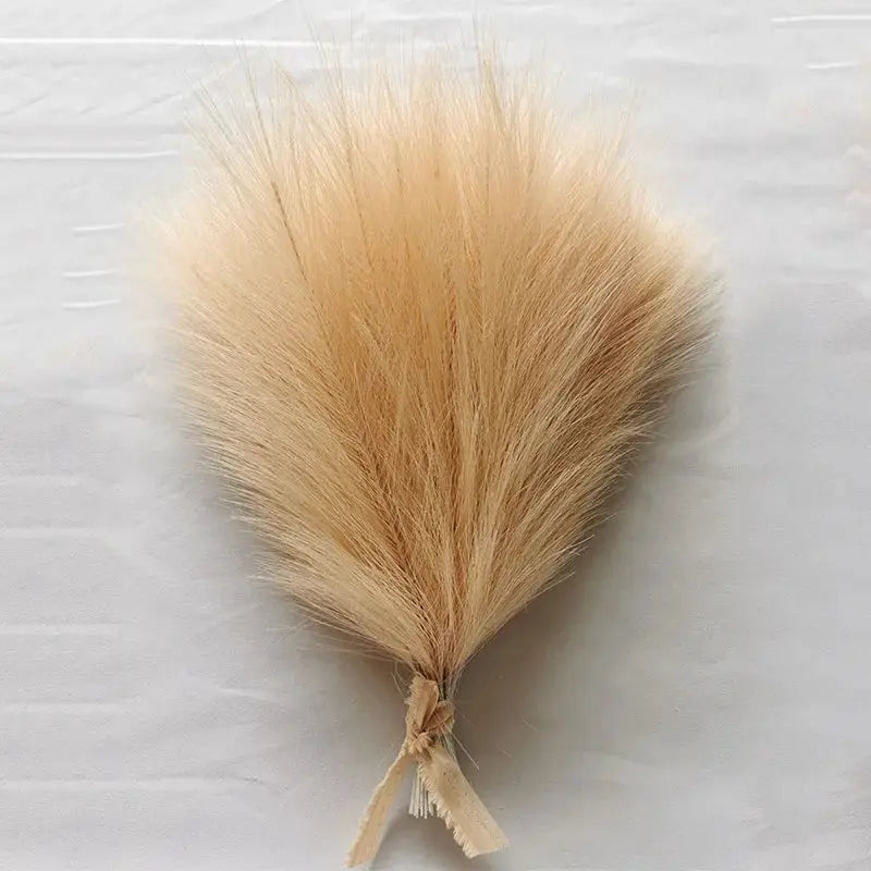 Artificial pampas grass bouquet, fluffy beige reed cluster tied with twine for boho party and wedding decor