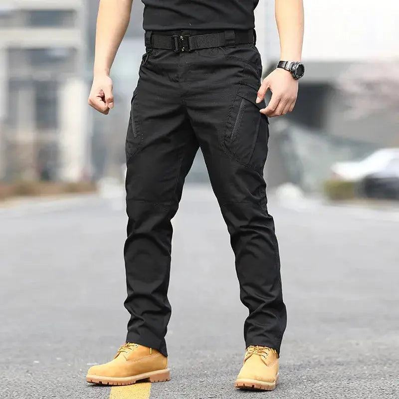 Tactical cargo pants for men, black combat trousers with multiple pockets, durable hiking/workwear style, size 6XL