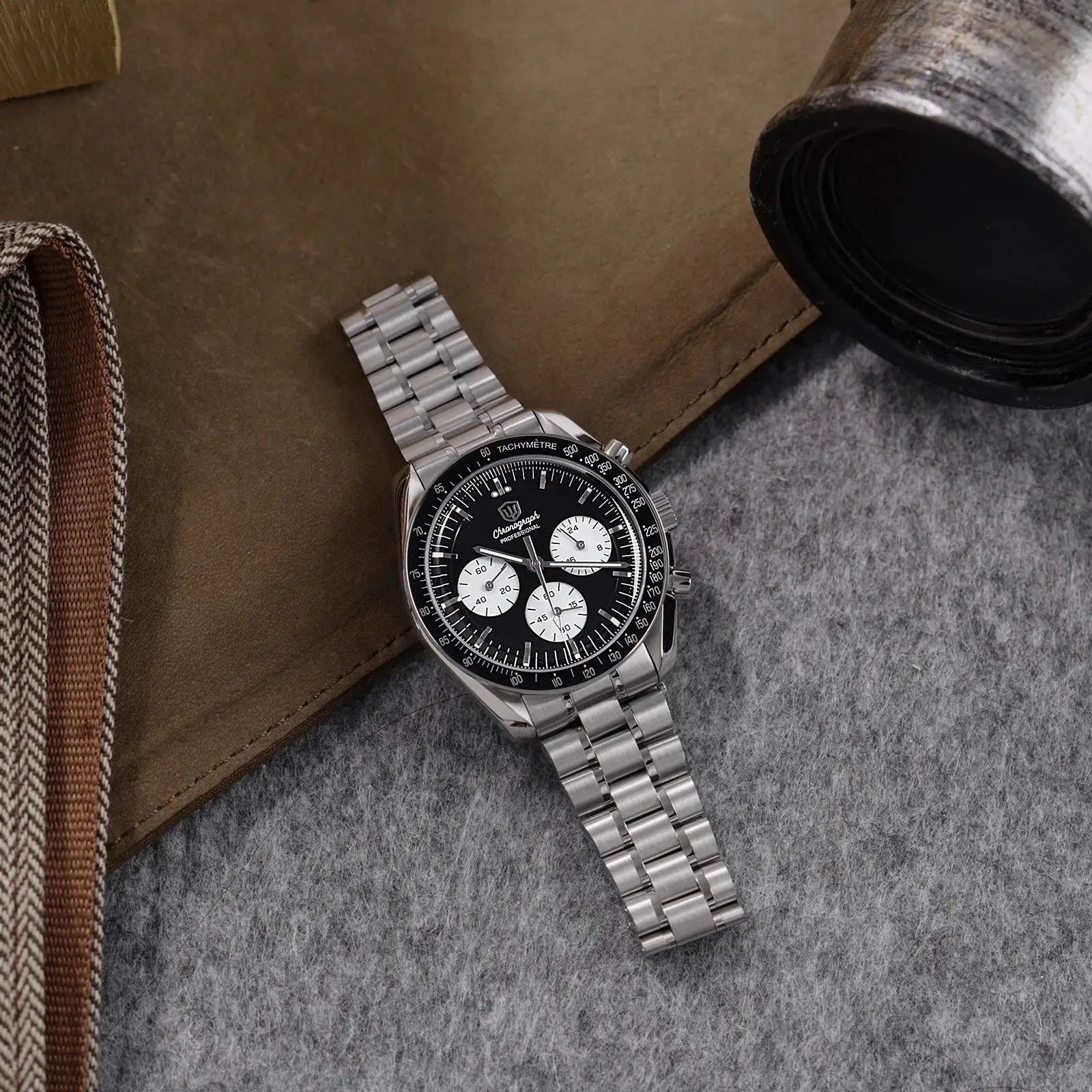 Chronograph watch with stainless steel bracelet, black dial, white subdials and tachymeter bezel