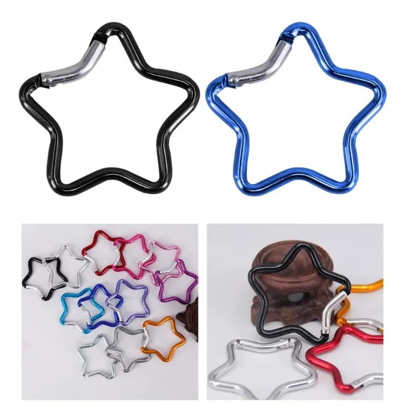 Simples Market aluminum star-shaped spring locking carabiner keychains; assorted colors, set of multiple pieces.