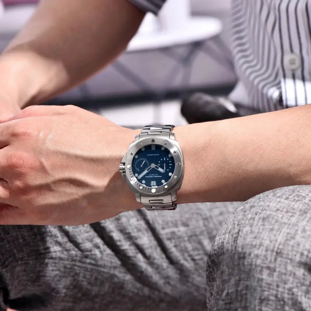 PAGANI Design men's automatic dive watch with blue dial, stainless steel case and bracelet, 200m water resistance.