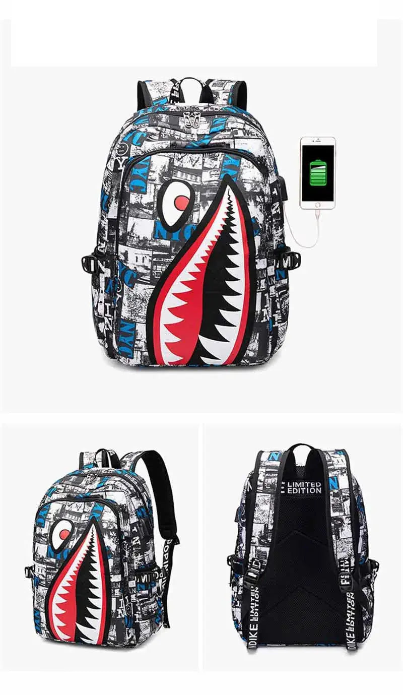 Backpack with cartoon shark mouth print on gray/black city-pattern fabric, blue accents