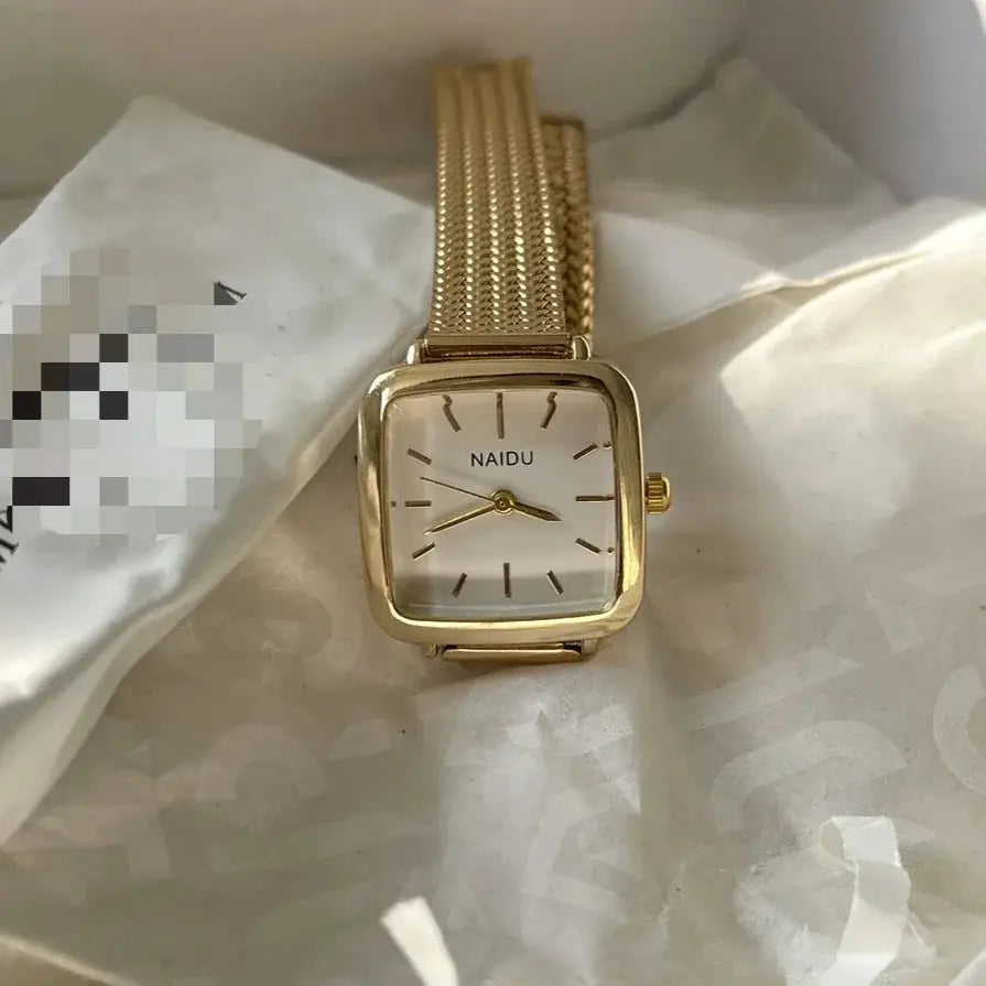 Women's gold-tone square quartz watch with a mesh bracelet by NAIDU