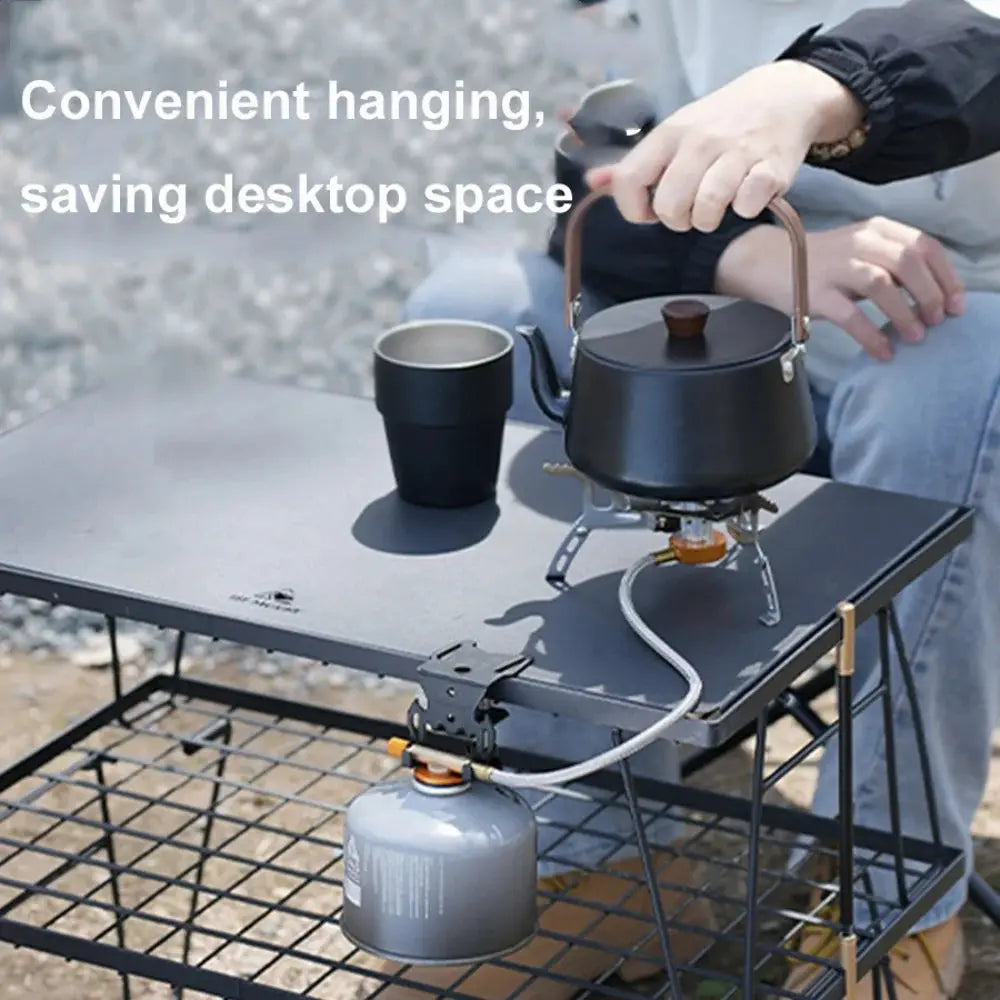 Hang gas canister hook with hanging plate and bottle opener for camping tables and stoves.