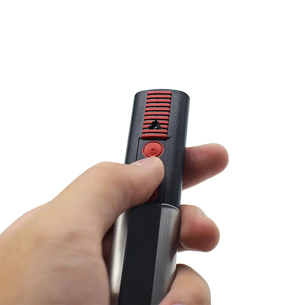 Garage door remote control handheld, black with red button and ribbed red grip.