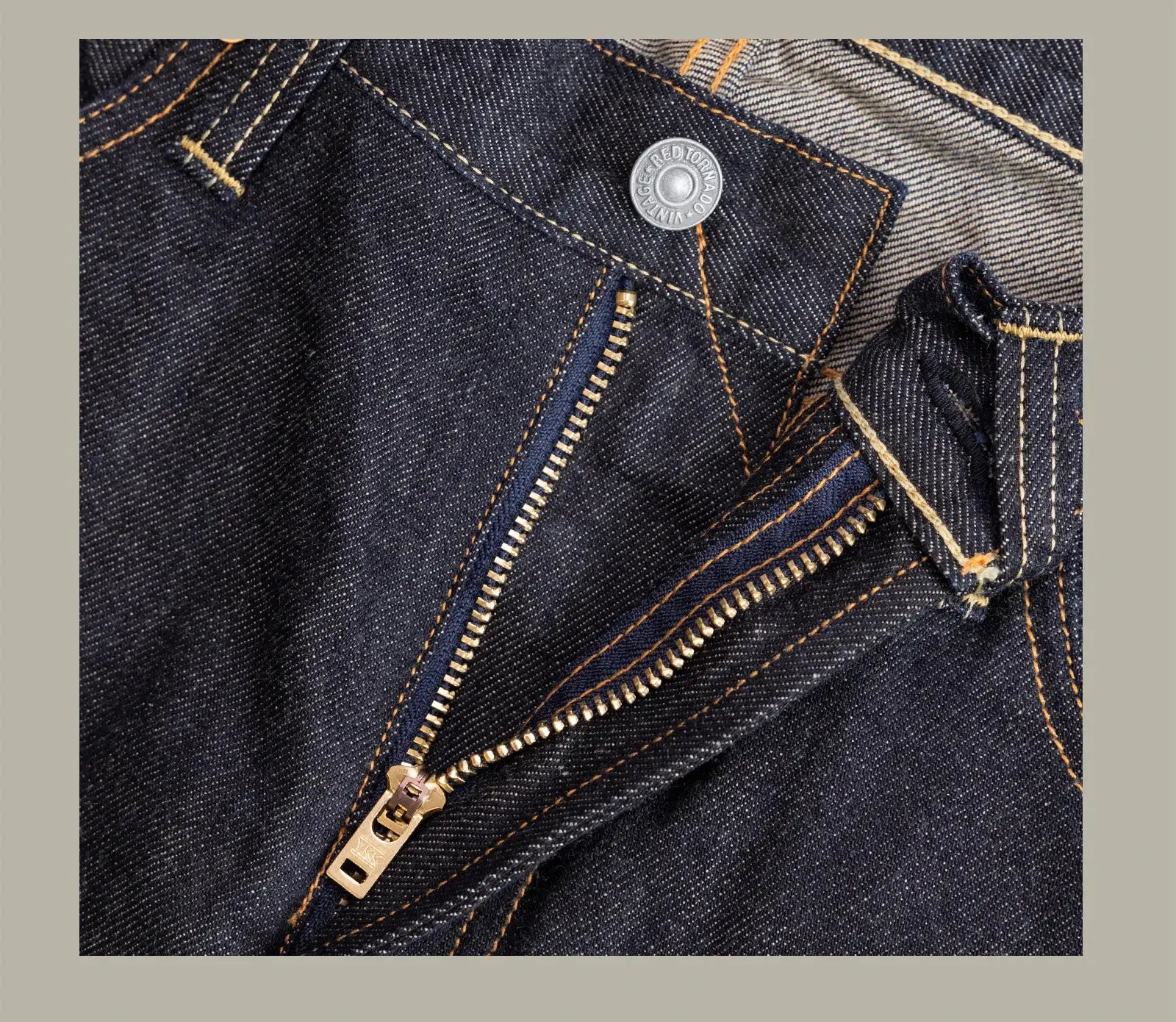 Red Tornado jeans by Simples Market; dark indigo 12oz denim with gold zipper and orange stitching details